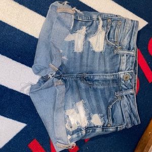 Distressed High waisted denim shorts.